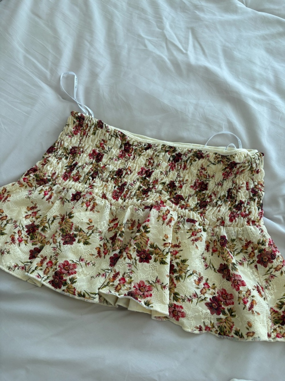 White Fox Boutique Cream Mini Skirt with Pink Floral Print